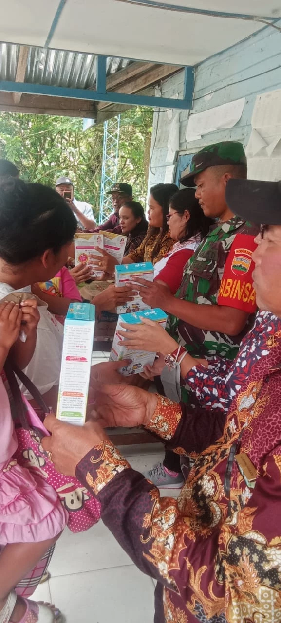 Babinsa Dolok Pardamean Hadiri Pemberian Makanan Tambahan (PMT) serta Musyawarah Rumah Desa Sehat(RDS)