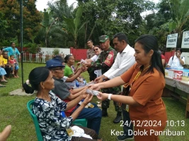 Babinsa Koramil 09/Tiga Balata Kodim 0207/Simalungun, melaksanakan kegiatan pemberian Makanan Tambahan (PMT) 